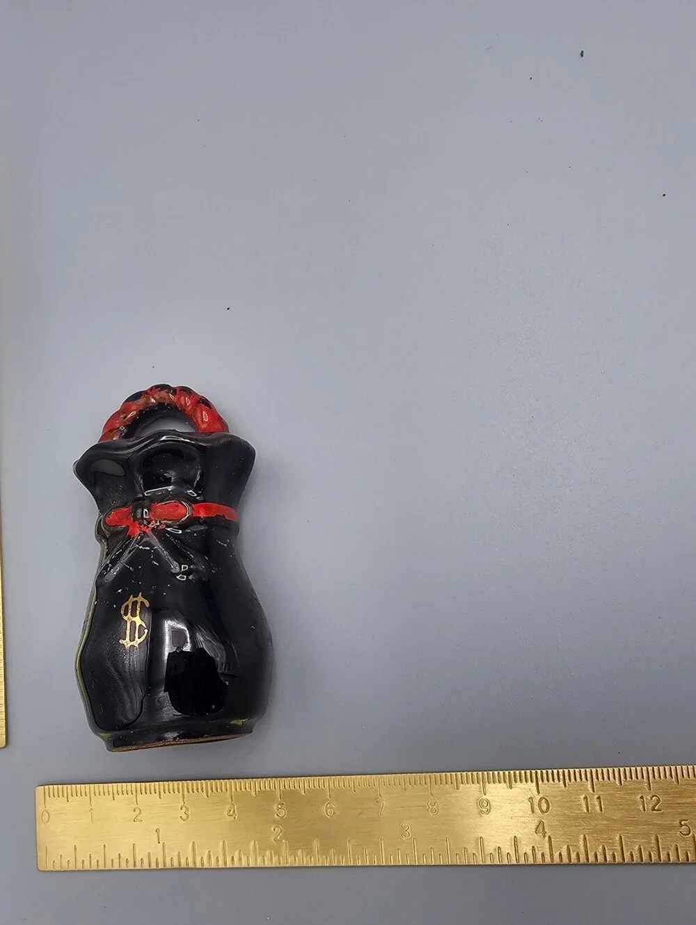 Vintage Black Ceramic Money Bag Salt and Pepper Shakers with Red Handles